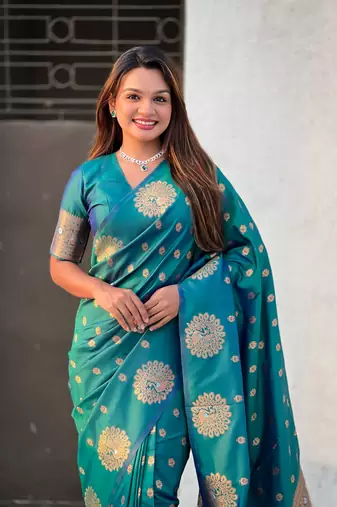 Green soft silk blend dual zari woven saree with peacock border