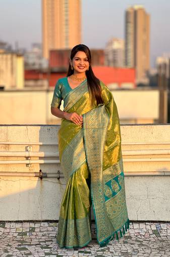 Green pure tissue zari woven saree with contrast weaves