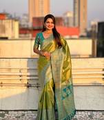 Green pure tissue zari woven saree with contrast weaves