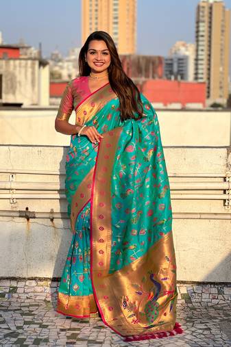 Firozi blue paithani jaal silk blend zari woven saree