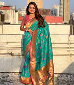 Firozi blue paithani jaal silk blend zari woven saree