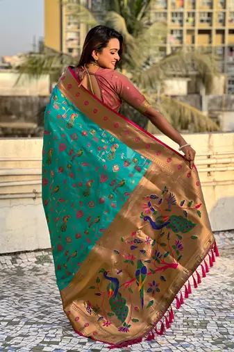 Firozi blue paithani jaal silk blend zari woven saree