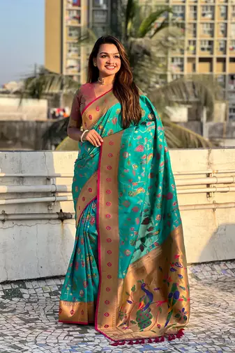 Firozi blue paithani jaal silk blend zari woven saree
