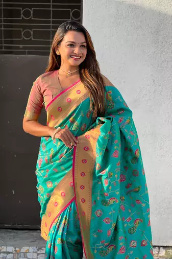 Firozi blue paithani jaal silk blend zari woven saree
