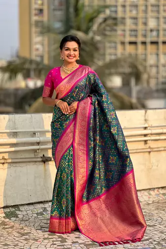Green soft silk blend zari woven premium patola saree with contrast weaves