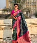 Green soft silk blend zari woven premium patola saree with contrast weaves