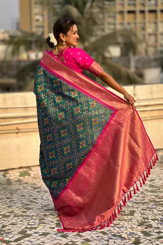 Green soft silk blend zari woven premium patola saree with contrast weaves