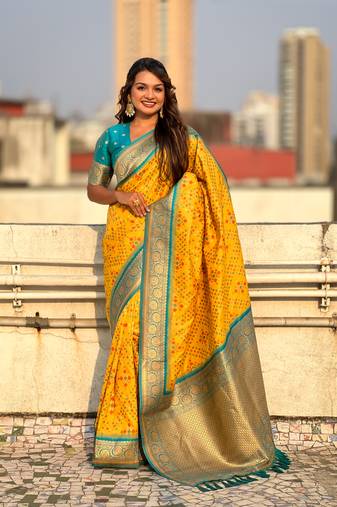 Yellow soft silk blend zari woven premium patola saree with contrast weaves