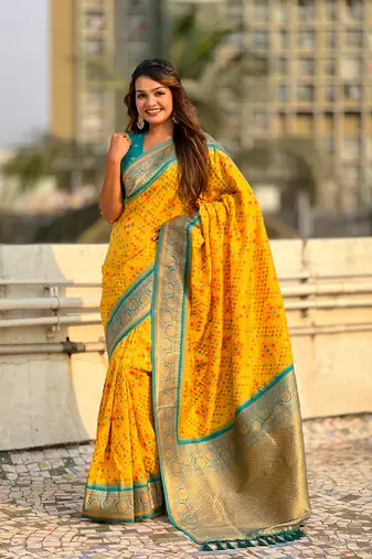 Yellow soft silk blend zari woven premium patola saree with contrast weaves