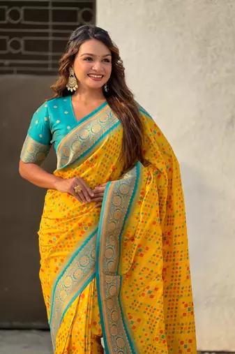 Yellow soft silk blend zari woven premium patola saree with contrast weaves