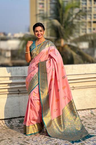 Baby pink soft silk blend saree with flower butta meenakari zari woven saree