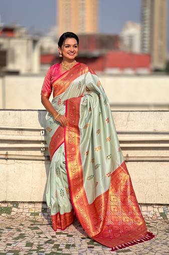Sky blue soft silk blend saree with flower butta meenakari zari woven saree
