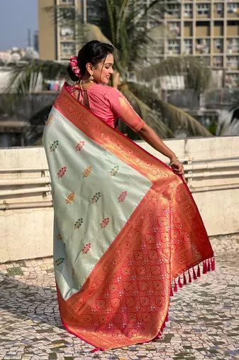 Sky blue soft silk blend saree with flower butta meenakari zari woven saree