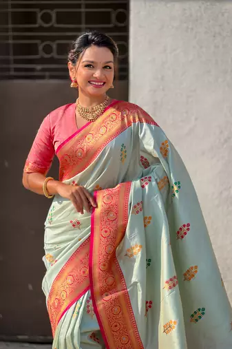 Sky blue soft silk blend saree with flower butta meenakari zari woven saree
