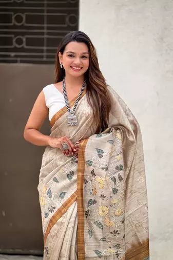 Yellow katki silk blend floral printed saree with piping border