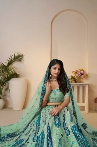 Royal Grandeur bridal Brown  Lehenga with Paisley and Peacock Motifs & Heavy Embroidery