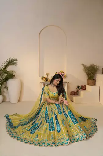 Alluring Bel Butti pattern Golden Sangeet Lehenga Choli