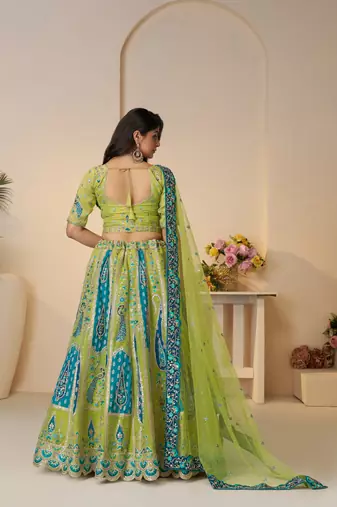 Alluring Bel Butti pattern Golden Sangeet Lehenga Choli