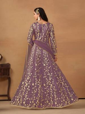 Purple net heavy embroidery semi stitched wedding gowns 2