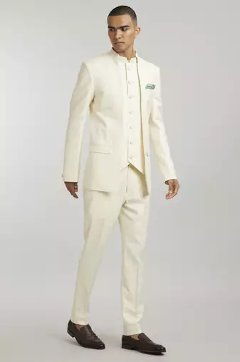 Ivory leon embroidered layered bandhgala jacket and ivory trousers