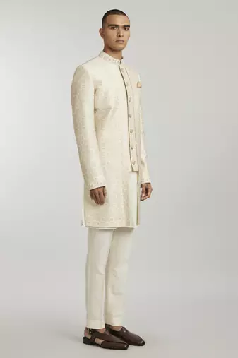 Ivory emblem printed layered sherwani jacket