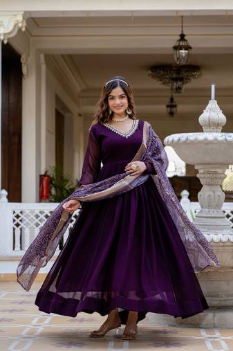 Wine faux georgette pearl hand work flared gown with heavy dupatta
