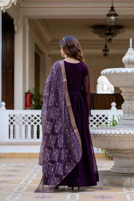 Wine faux georgette pearl hand work flared gown with heavy dupatta 2
