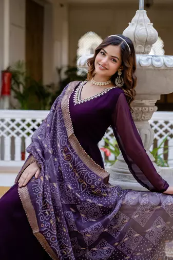 Wine faux georgette pearl hand work flared gown with heavy dupatta