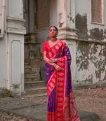 Wine banarasi silk weaving saree with zari woven fancy tassels 