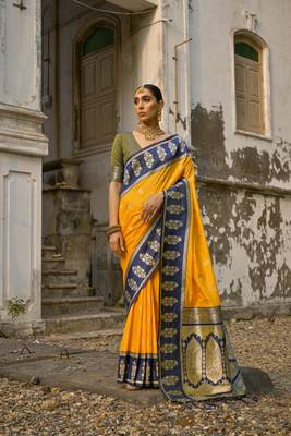Yellow banarasi silk weaving saree with zari woven fancy tassels  1