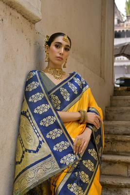 Yellow banarasi silk weaving saree with zari woven fancy tassels  2