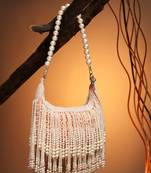droop coral & pearl white pearl embellished velvet clutch