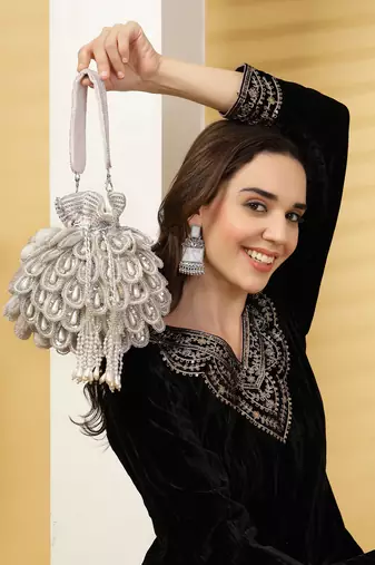 Anekaant droop white & silver cut work embellished velvet potli