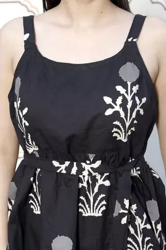 pure cotton black floral printed round neck peplum noodle straps top