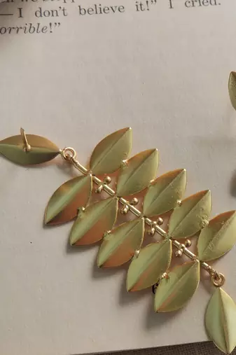 Gold leaf shape statement earring