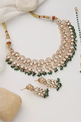 Green rose gold polki necklace set with maang tikka