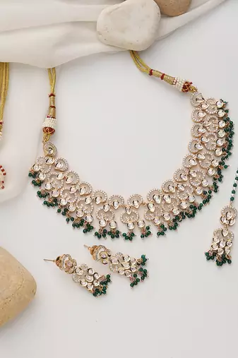 Green rose gold polki necklace set with maang tikka