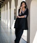 Black short kurta embroidered co-ord set.