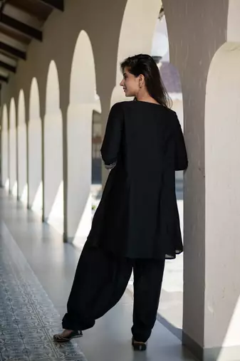 Black short kurta embroidered co-ord set.