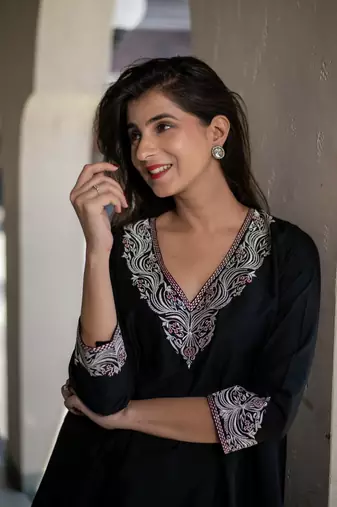 Black short kurta embroidered co-ord set.
