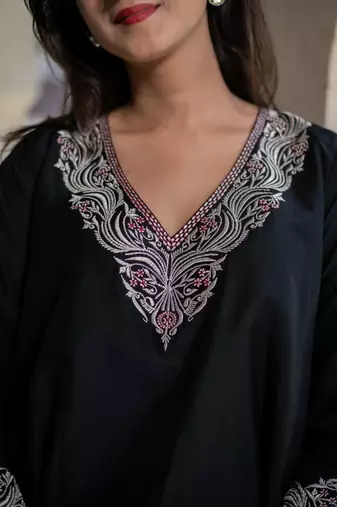 Black short kurta embroidered co-ord set.