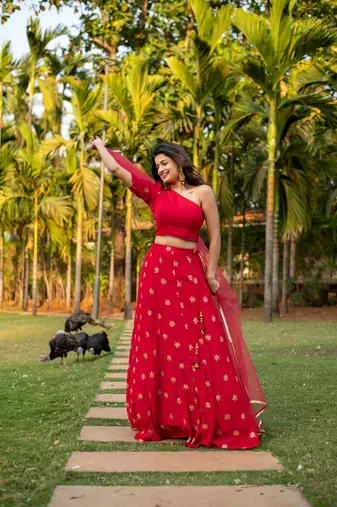 Red one shoulder Lehenga