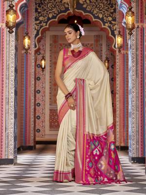 cream ikat pattern banarasi silk blend jacquard work saree 1