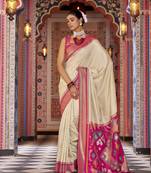 cream ikat pattern banarasi silk blend jacquard work saree