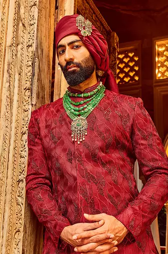 Deep red chanderi silk asymmetrical sherwani