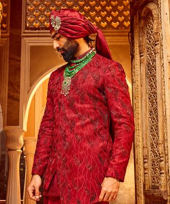 Deep red chanderi silk asymmetrical sherwani 4
