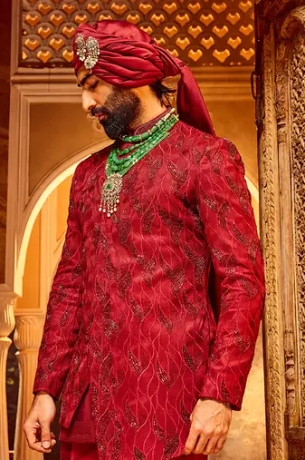 Deep red chanderi silk asymmetrical sherwani