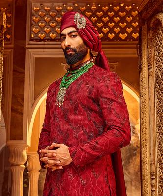 Deep red chanderi silk asymmetrical sherwani 5