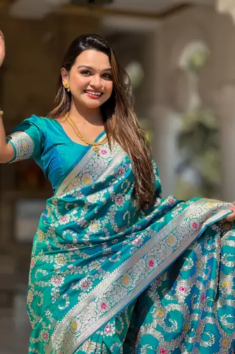 teal green weaving zari meenakari work silk blend saree