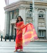 Red handwoven mul cotton saree with checks & tassels
